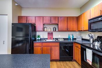 Modern walnut kitchen cabinetry